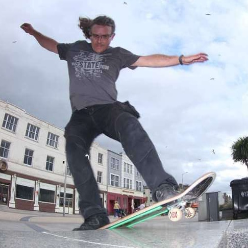 Photo of Spiny on skateboard